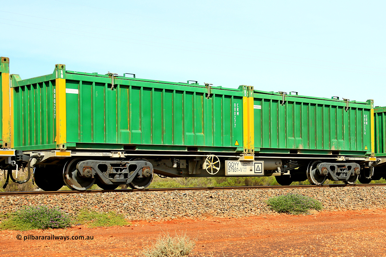 231020 8219
Parkeston, QQYY type 40' container waggon QQYY 57931 one of five hundred ordered by Aurizon and built by CRRC Yangtze Group of China in 2022. In service with two loaded 20' half height hard top 'rotainers' lettered CRM, for Cristal Mining before they were absorbed into Tronox, CRM 000254 with Tronox decal and yellow corner posts and CRM 000277 with Cristal decal and yellow corner posts, on Aurizon's Tronox mineral sands train 4UP1 from Ivanhoe / Broken Hill (NSW) to Kwinana (WA). 20th of October 2023.
Keywords: QQYY-type;QQYY57931;CRRC-Yangtze-Group-China;
