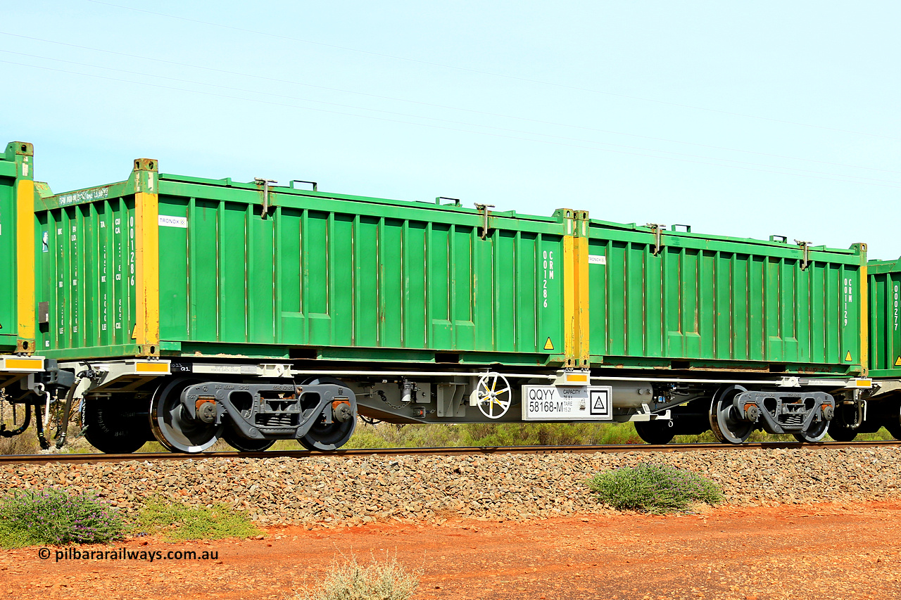 231020 8220
Parkeston, QQYY type 40' container waggon QQYY 58168 one of five hundred ordered by Aurizon and built by CRRC Yangtze Group of China in 2022. In service with two loaded 20' half height hard top 'rotainers' lettered CRM, for Cristal Mining before they were absorbed into Tronox, CRM 001129 with Tronox decal and yellow corner posts and CRM 001286 with Tronox decal and yellow corner posts, on Aurizon's Tronox mineral sands train 4UP1 from Ivanhoe / Broken Hill (NSW) to Kwinana (WA). 20th of October 2023.
Keywords: QQYY-type;QQYY58168;CRRC-Yangtze-Group-China;