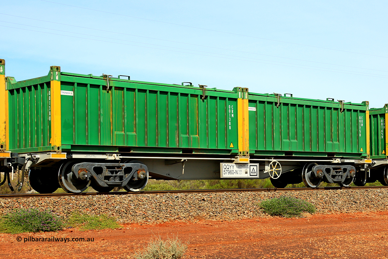 231020 8228
Parkeston, QQYY type 40' container waggon QQYY 57960 one of five hundred ordered by Aurizon and built by CRRC Yangtze Group of China in 2022. In service with two loaded 20' half height hard top 'rotainers' lettered CRM, for Cristal Mining before they were absorbed into Tronox, CRM 001750 with Tronox decal and yellow corner posts and CRM 001388 with Tronox decal and yellow corner posts, on Aurizon's Tronox mineral sands train 4UP1 from Ivanhoe / Broken Hill (NSW) to Kwinana (WA). 20th of October 2023.
Keywords: QQYY-type;QQYY57960;CRRC-Yangtze-Group-China;