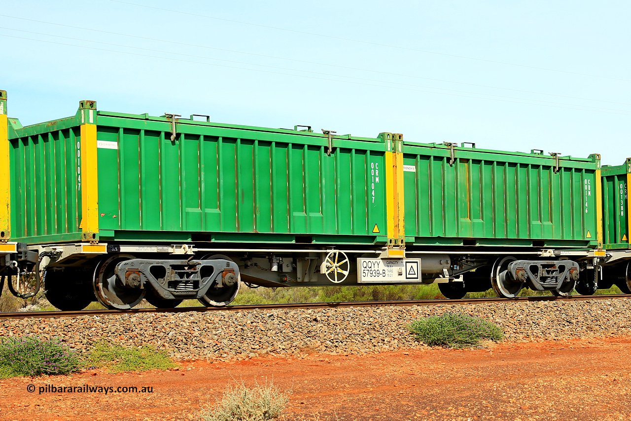 231020 8229
Parkeston, QQYY type 40' container waggon QQYY 57939 one of five hundred ordered by Aurizon and built by CRRC Yangtze Group of China in 2022. In service with two loaded 20' half height hard top 'rotainers' lettered CRM, for Cristal Mining before they were absorbed into Tronox, CRM 001146 with Tronox decal and yellow corner posts and CRM 001047 with Cristal decal and yellow corner posts, on Aurizon's Tronox mineral sands train 4UP1 from Ivanhoe / Broken Hill (NSW) to Kwinana (WA). 20th of October 2023.
Keywords: QQYY-type;QQYY57939;CRRC-Yangtze-Group-China;