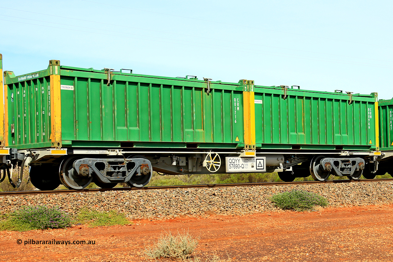 231020 8230
Parkeston, QQYY type 40' container waggon QQYY 57690 one of five hundred ordered by Aurizon and built by CRRC Yangtze Group of China in 2022. In service with two loaded 20' half height hard top 'rotainers' lettered CRM, for Cristal Mining before they were absorbed into Tronox, CRM 000966 with Tronox decal and yellow corner posts and CRM 001716 with Tronox decal and yellow corner posts, on Aurizon's Tronox mineral sands train 4UP1 from Ivanhoe / Broken Hill (NSW) to Kwinana (WA). 20th of October 2023.
Keywords: QQYY-type;QQYY57690;CRRC-Yangtze-Group-China;