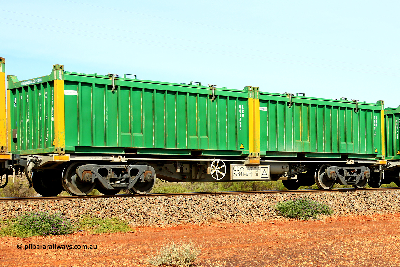 231020 8232
Parkeston, QQYY type 40' container waggon QQYY 57841 one of five hundred ordered by Aurizon and built by CRRC Yangtze Group of China in 2022. In service with two loaded 20' half height hard top 'rotainers' lettered CRM, for Cristal Mining before they were absorbed into Tronox, CRM 000937 with Tronox decal and yellow corner posts and CRM 001630 with Cristal decal and yellow corner posts, on Aurizon's Tronox mineral sands train 4UP1 from Ivanhoe / Broken Hill (NSW) to Kwinana (WA). 20th of October 2023.
Keywords: QQYY-type;QQYY57841;CRRC-Yangtze-Group-China;