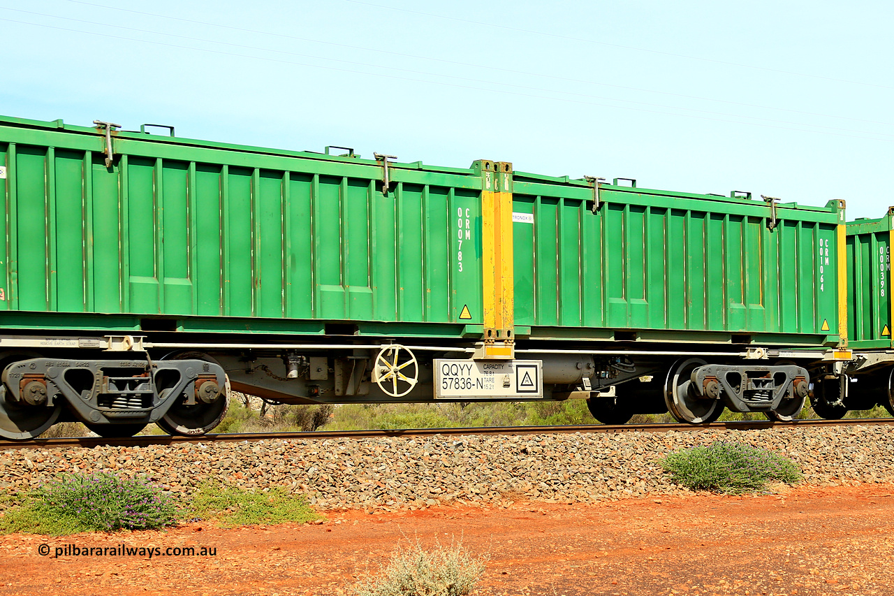 231020 8235
Parkeston, QQYY type 40' container waggon QQYY 57836 one of five hundred ordered by Aurizon and built by CRRC Yangtze Group of China in 2022. In service with two loaded 20' half height hard top 'rotainers' lettered CRM, for Cristal Mining before they were absorbed into Tronox, CRM 001064 with Tronox decal and yellow corner posts and CRM 000783 with Tronox decal and yellow corner posts, on Aurizon's Tronox mineral sands train 4UP1 from Ivanhoe / Broken Hill (NSW) to Kwinana (WA). 20th of October 2023.
Keywords: QQYY-type;QQYY57836;CRRC-Yangtze-Group-China;