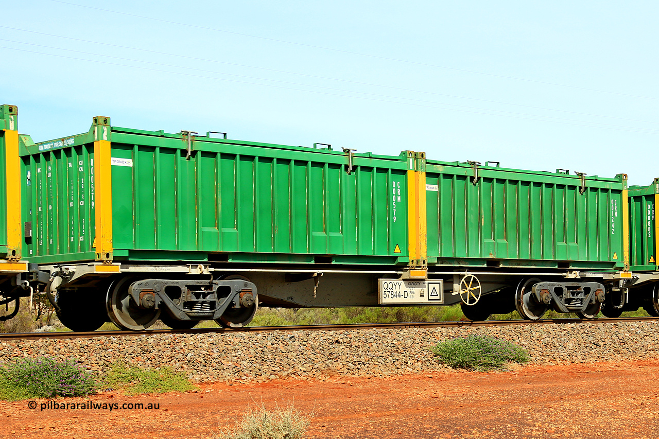 231020 8237
Parkeston, QQYY type 40' container waggon QQYY 57844 one of five hundred ordered by Aurizon and built by CRRC Yangtze Group of China in 2022. In service with two loaded 20' half height hard top 'rotainers' lettered CRM, for Cristal Mining before they were absorbed into Tronox, CRM 001242 with Tronox decal and yellow corner posts and CRM 000579 with Tronox decal and yellow corner posts, on Aurizon's Tronox mineral sands train 4UP1 from Ivanhoe / Broken Hill (NSW) to Kwinana (WA). 20th of October 2023.
Keywords: QQYY-type;QQYY57844;CRRC-Yangtze-Group-China;