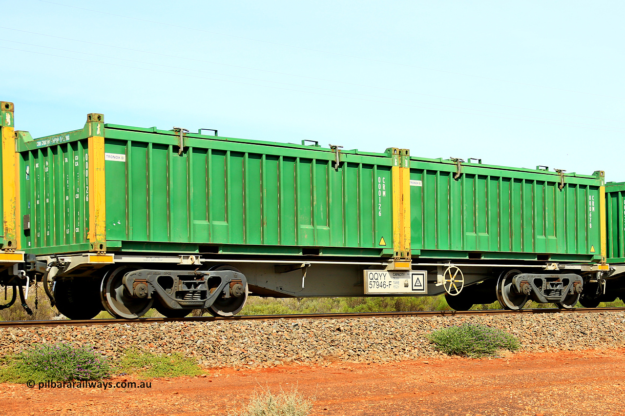 231020 8239
Parkeston, QQYY type 40' container waggon QQYY 57946 one of five hundred ordered by Aurizon and built by CRRC Yangtze Group of China in 2022. In service with two loaded 20' half height hard top 'rotainers' lettered CRM, for Cristal Mining before they were absorbed into Tronox, CRM 000678 with Tronox decal and yellow corner posts and CRM 000126 with Tronox decal and yellow corner posts, on Aurizon's Tronox mineral sands train 4UP1 from Ivanhoe / Broken Hill (NSW) to Kwinana (WA). 20th of October 2023.
Keywords: QQYY-type;QQYY57946;CRRC-Yangtze-Group-China;
