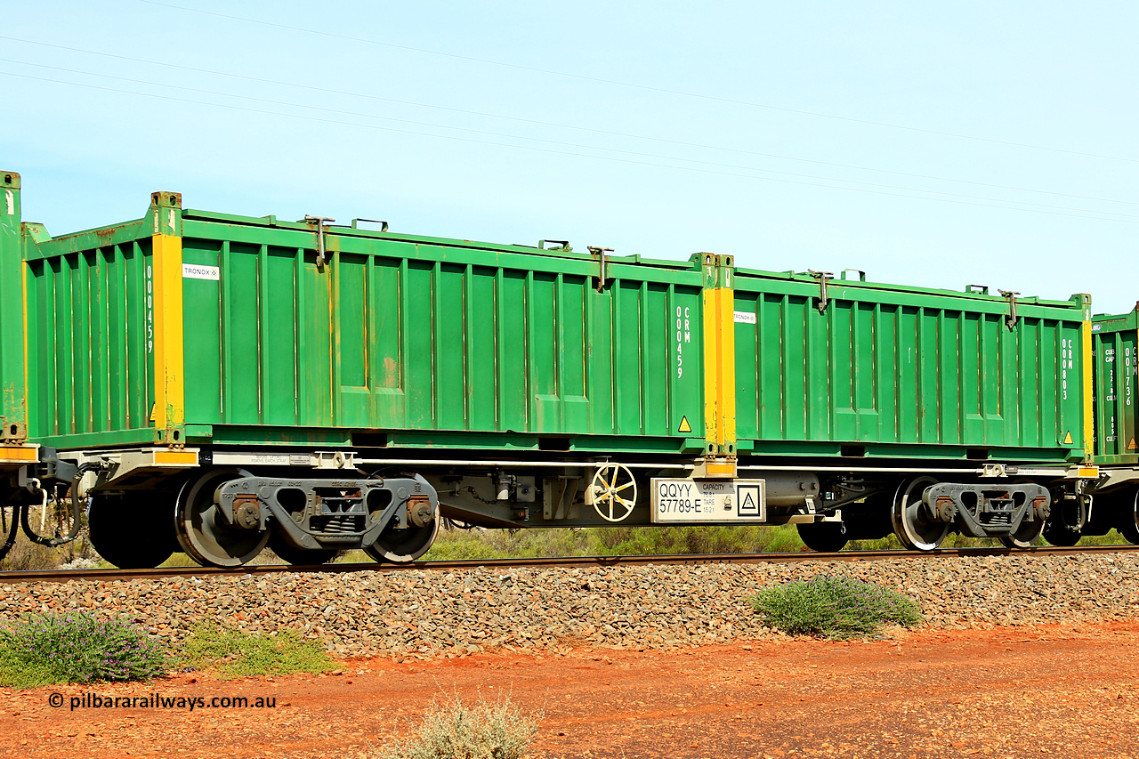 231020 8242
Parkeston, QQYY type 40' container waggon QQYY 57789 one of five hundred ordered by Aurizon and built by CRRC Yangtze Group of China in 2022. In service with two loaded 20' half height hard top 'rotainers' lettered CRM, for Cristal Mining before they were absorbed into Tronox, CRM 000803 with Tronox decal and yellow corner posts and CRM 000459 with Tronox decal and yellow corner posts, on Aurizon's Tronox mineral sands train 4UP1 from Ivanhoe / Broken Hill (NSW) to Kwinana (WA). 20th of October 2023.
Keywords: QQYY-type;QQYY57789;CRRC-Yangtze-Group-China;