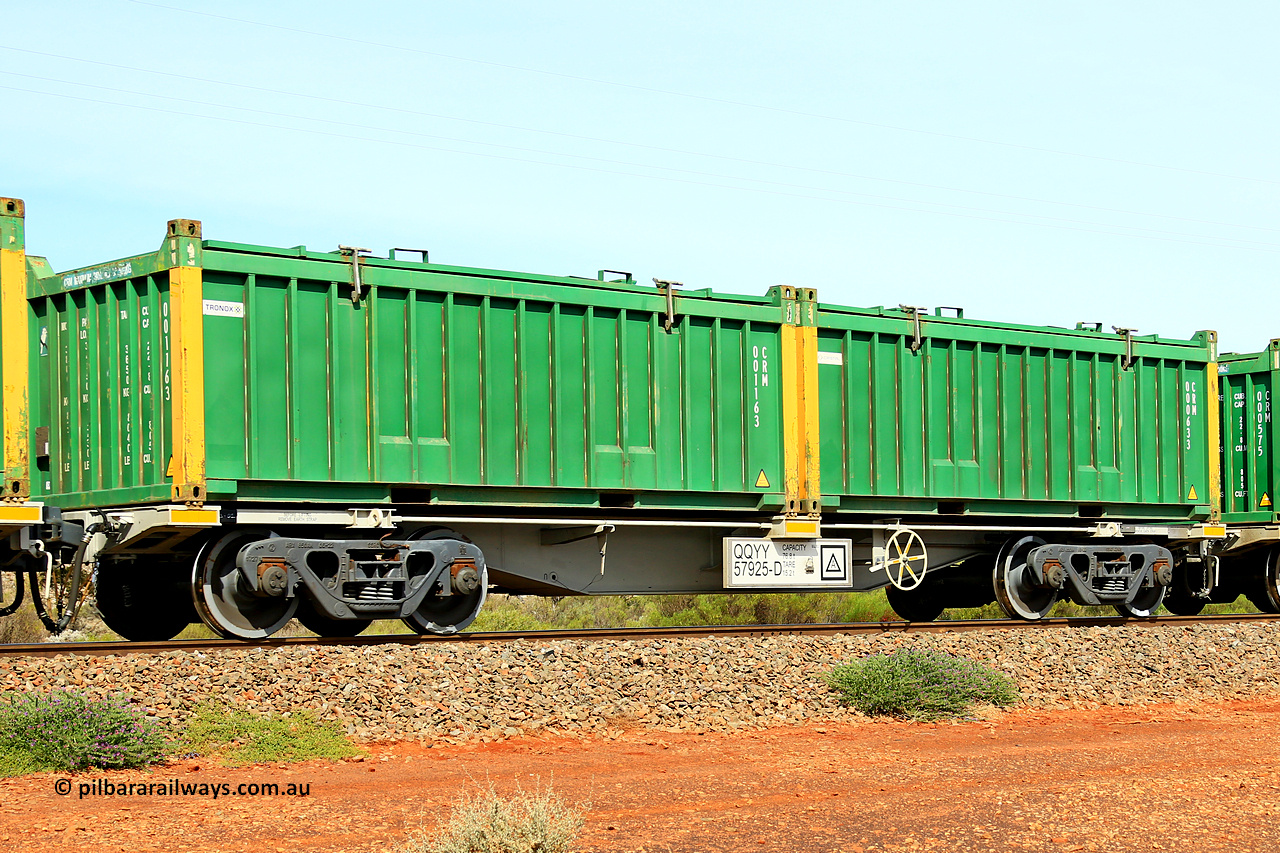 231020 8246
Parkeston, QQYY type 40' container waggon QQYY 57925 one of five hundred ordered by Aurizon and built by CRRC Yangtze Group of China in 2022. In service with two loaded 20' half height hard top 'rotainers' lettered CRM, for Cristal Mining before they were absorbed into Tronox, CRM 000633 with Cristal decal and yellow corner posts and CRM 001163 with Tronox decal and yellow corner posts, on Aurizon's Tronox mineral sands train 4UP1 from Ivanhoe / Broken Hill (NSW) to Kwinana (WA). 20th of October 2023.
Keywords: QQYY-type;QQYY57925;CRRC-Yangtze-Group-China;