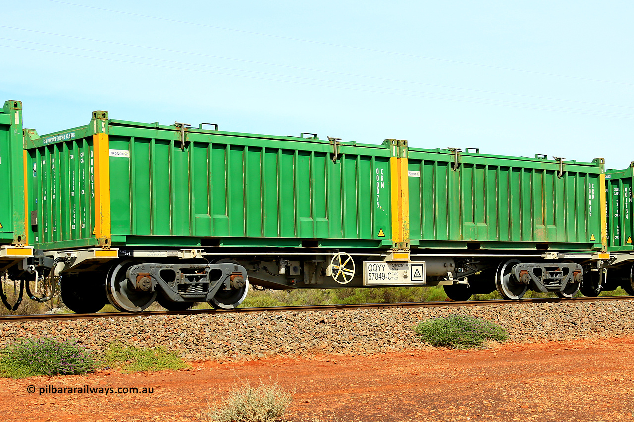 231020 8249
Parkeston, QQYY type 40' container waggon QQYY 57849 one of five hundred ordered by Aurizon and built by CRRC Yangtze Group of China in 2022. In service with two loaded 20' half height hard top 'rotainers' lettered CRM, for Cristal Mining before they were absorbed into Tronox, CRM 000045 with Tronox decal and yellow corner posts and CRM 000075 with Tronox decals and yellow corner posts, on Aurizon's Tronox mineral sands train 4UP1 from Ivanhoe / Broken Hill (NSW) to Kwinana (WA). 20th of October 2023.
Keywords: QQYY-type;QQYY57849;CRRC-Yangtze-Group-China;