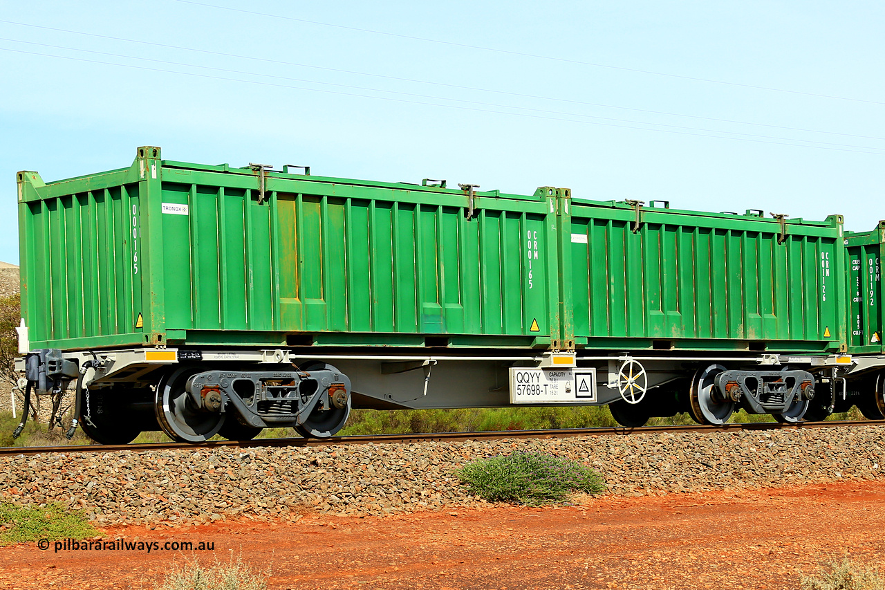 231020 8256
Parkeston, QQYY type 40' container waggon QQYY 57698 one of five hundred ordered by Aurizon and built by CRRC Yangtze Group of China in 2022. In service with two loaded 20' half height hard top 'rotainers' lettered CRM, for Cristal Mining before they were absorbed into Tronox, CRM 001126 with Cristal decal and CRM 000165 with Tronox decal, on Aurizon's Tronox mineral sands train 4UP1 from Ivanhoe / Broken Hill (NSW) to Kwinana (WA). 20th of October 2023.
Keywords: QQYY-type;QQYY57698;CRRC-Yangtze-Group-China;