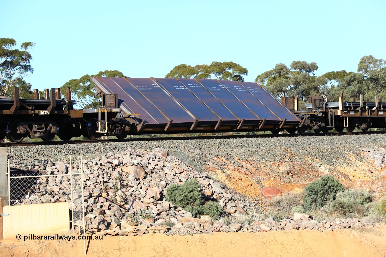 160522 2064
Binduli, 5MP2 steel train, RKYY type wide steel plate tilt waggon RKYY 7109, one of twenty seven units built by AN Rail Islington Workshops in 1995-96. Loaded with steel plate.
Keywords: RKYY-type;RKYY7109;AN-Islington-WS;