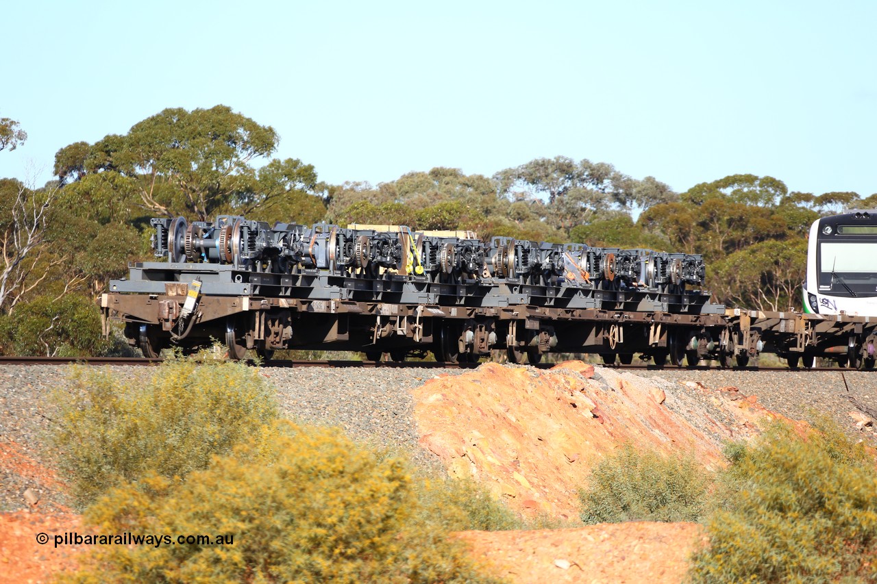 160522 2078
Binduli, 5MP2 steel train, view from rear looking at NQOY 15056 and RQCY 701 loaded with bogies for Trans-Perth B set 116. NQOY type waggon built by Comeng NSW in batch of seventy OCY type waggons in 1974/75.
Keywords: NQOY-type;NQOY15056;Comeng-NSW;OCY-type;RQCY-type;RQCY701;
