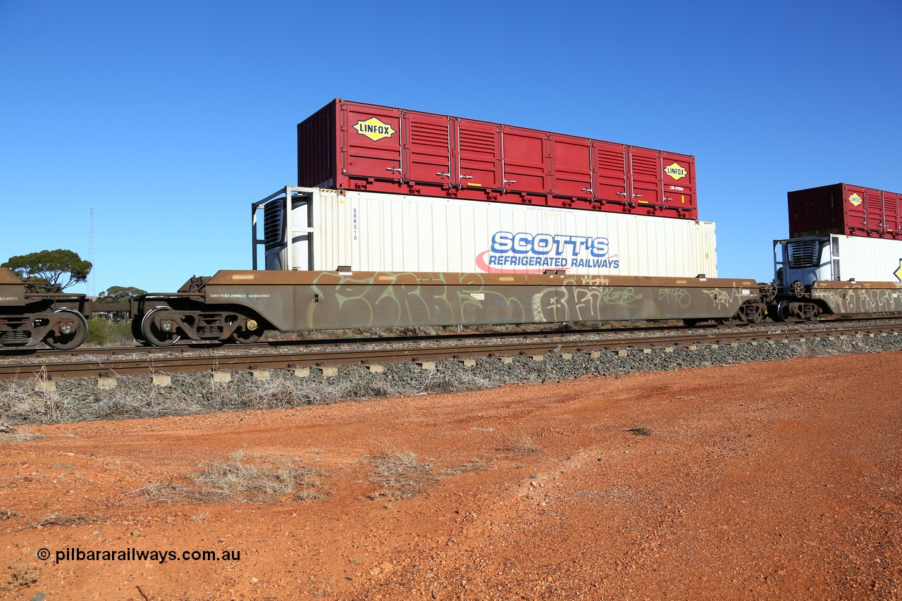 160522 2103
Parkeston, 6MP4 intermodal train, platform 2 of 5-pack RRRY 7014 well waggon set, one of nineteen built in China at Zhuzhou Rolling Stock Works for Goninan in 2005, Scott's Refrigerated Railways reefer SRR 010 and a half height side door red Linfox LSDU 6940064 container.
Keywords: RRRY-type;RRRY7014;CSR-Zhuzhou-Rolling-Stock-Works-China;