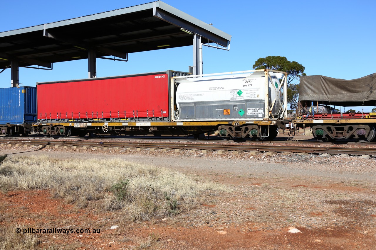 160522 2128
Parkeston, 6MP4 intermodal train, RQGY 34488 container waggon, one of a hundred built by Tulloch Ltd NSW as OCY type in 1974/75, recoded to NQOY, then modified to NQGY, loaded here with Air Liquide WA 20' ISO 22T7 type tanktainer AFLU 100032 and a 40' Royal Wolf curtainsider RWTU 903124.
Keywords: RQGY-type;RQGY34488;Tulloch-Ltd-NSW;OCY-type;NQOY-type;NQSY-type;NQGY-type;