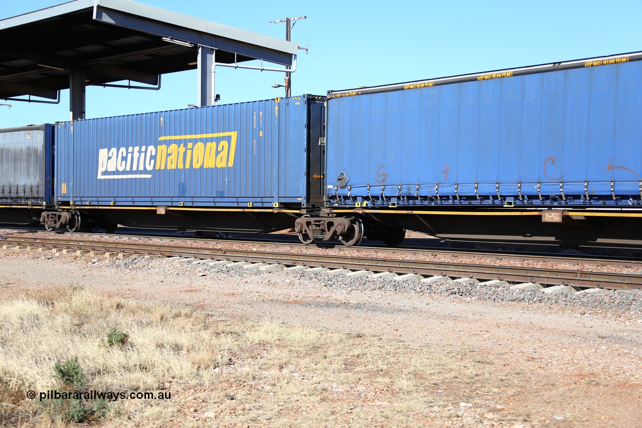 160522 2142
Parkeston, 6MP4 intermodal train, platform 3 of 5 pack RRGY 7123 5 pack articulated skel waggon set, originally built as RRBY by AN Rail at Islington Workshops SA 1996-97, recoded when decks rebuilt longer, 48' deck with a Pacific National 48' container PNXD 4211.
Keywords: RRGY-type;RRGY7123;AN-Islington-WS;RRBY-type;