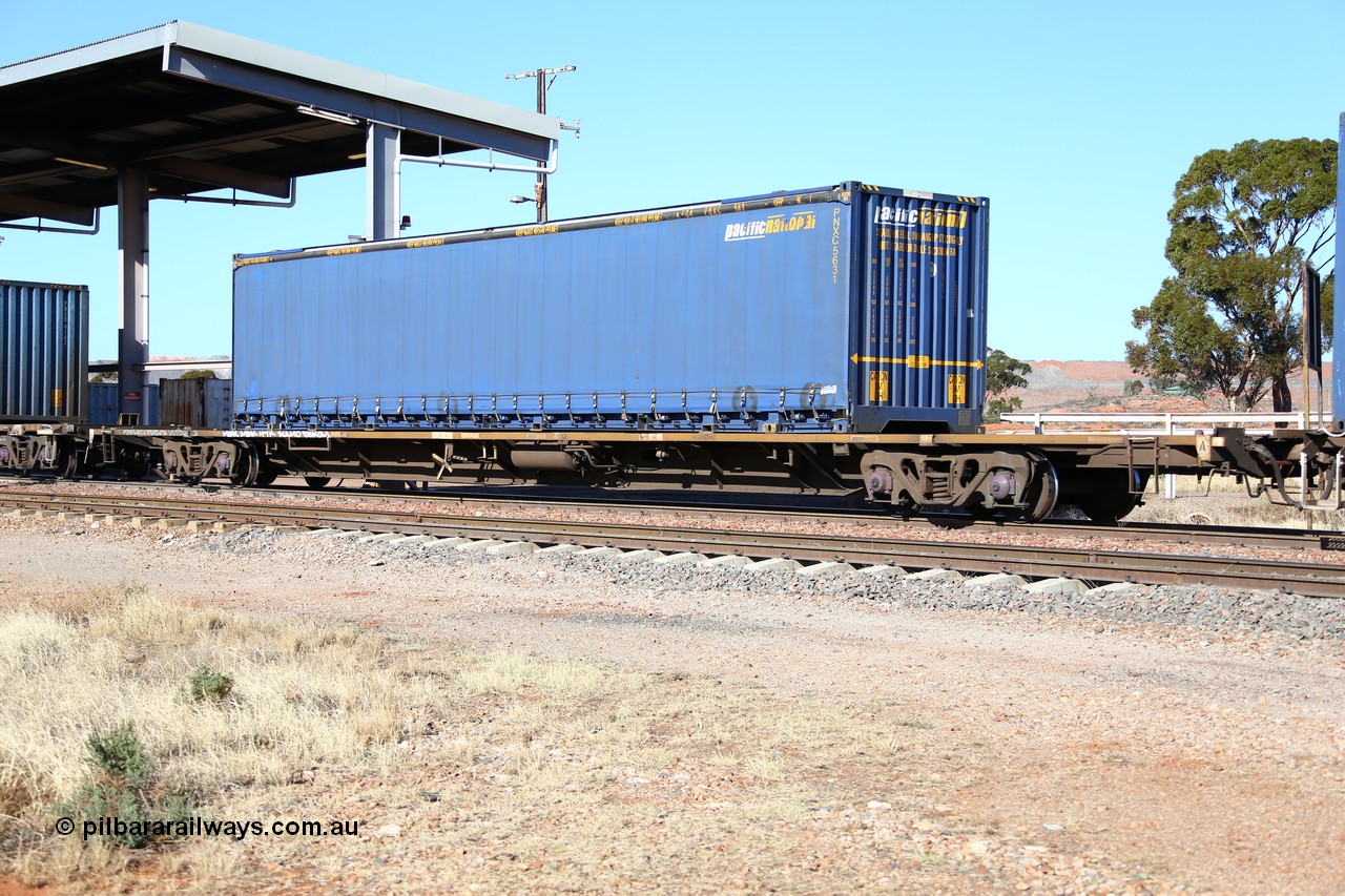 160522 2150
Parkeston, 6MP4 intermodal train, RQPW 60076 jumbo container waggon built by V/Line Bendigo Workshops in October 1984 as VQDW 68 as part of a batch of twenty-five, leased to the SRA NSW in 1986 as NQDW, then recoded in 1995 to RQPW, loaded with Pacific National 48' curtainsider container PNXC 5631.
Keywords: RQPW-type;RQPW60076;V/Line-Bendigo-WS;VQDW-type;VQDW68;NQMW-type;RQDW-type;