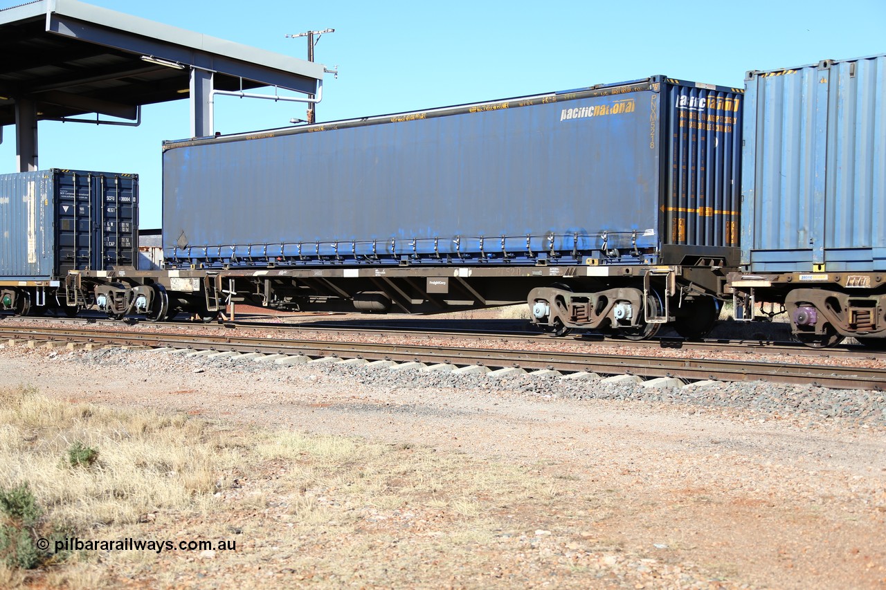 160522 2152
Parkeston, 6MP4 intermodal train, NQKY 34633 container waggon was originally built in a batch of two hundred CDY type open waggons by EPT (Electric Power Transmission) NSW between 1975 and 1976. Recoded to NOCY then modified in 1997 to NQKY. Loaded with a Pacific National 48' curtainsider container PNXM 5218.
Keywords: NQKY-type;NQKY34633;EPT-NSW;CDY-type;NOCY-type;