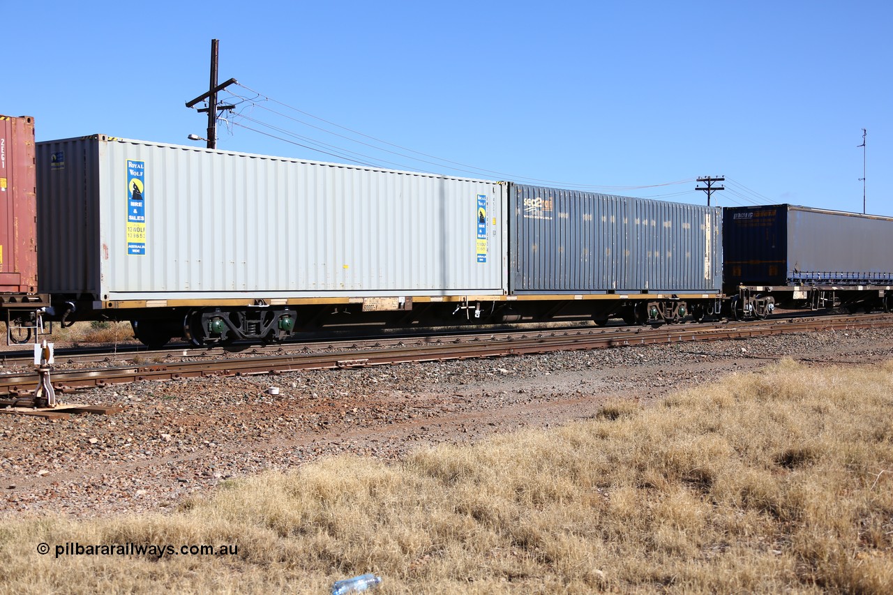 160522 2154
Parkeston, 6MP4 intermodal train, RQJW 60007 container waggon, one of fifty built by EPT NSW as NQJW type in 1984-85, with a pair of 40' containers, SCF sea2rail SCFU 408084 and Royal Wolf RWTU 441643.
Keywords: RQJW-type;RQJW60007;EPT-NSW;NQJW-type;