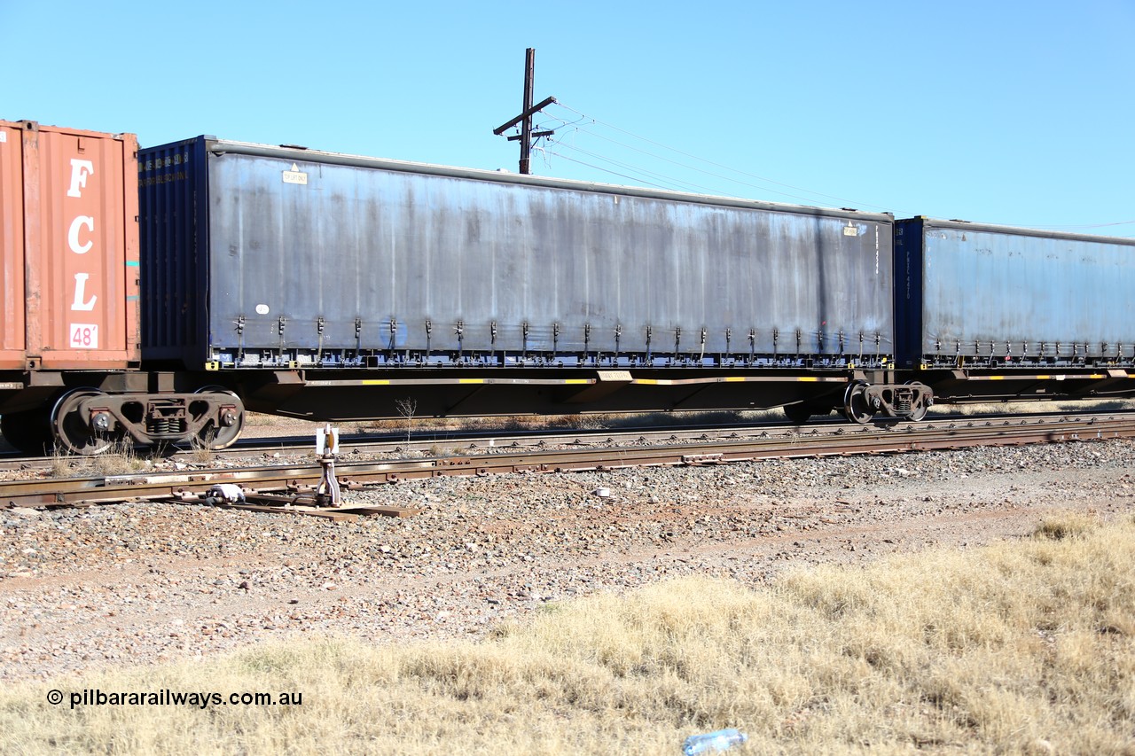160522 2176
Parkeston, 6MP4 intermodal train, RQQY 7076 platform 2 of 5-pack articulated skel waggon set, 1 of 17 built by Qld Rail at Ipswich Workshops in 1995, 48' curtainsider PNXM 4546.
Keywords: RQQY-type;RQQY7076;Qld-Rail-Ipswich-WS;