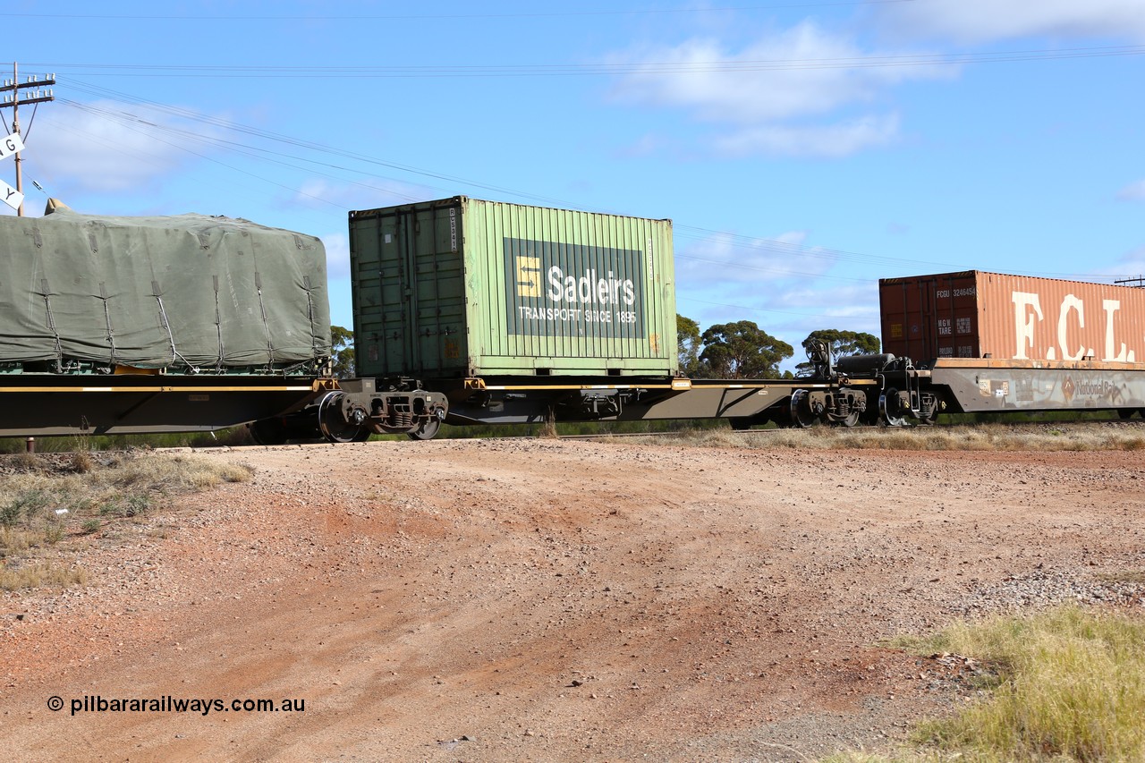 160522 2343
Parkeston, 7MP7 priority service train, platform 1 of 5-pack articulated skel waggon set, Qiqihar Rollingstock Works China built RRQY 5816, Sadleirs 20' box RCS 3410.
Keywords: RRQY-type;RRQY8516;Qiqihar-Rollingstock-Works-China;