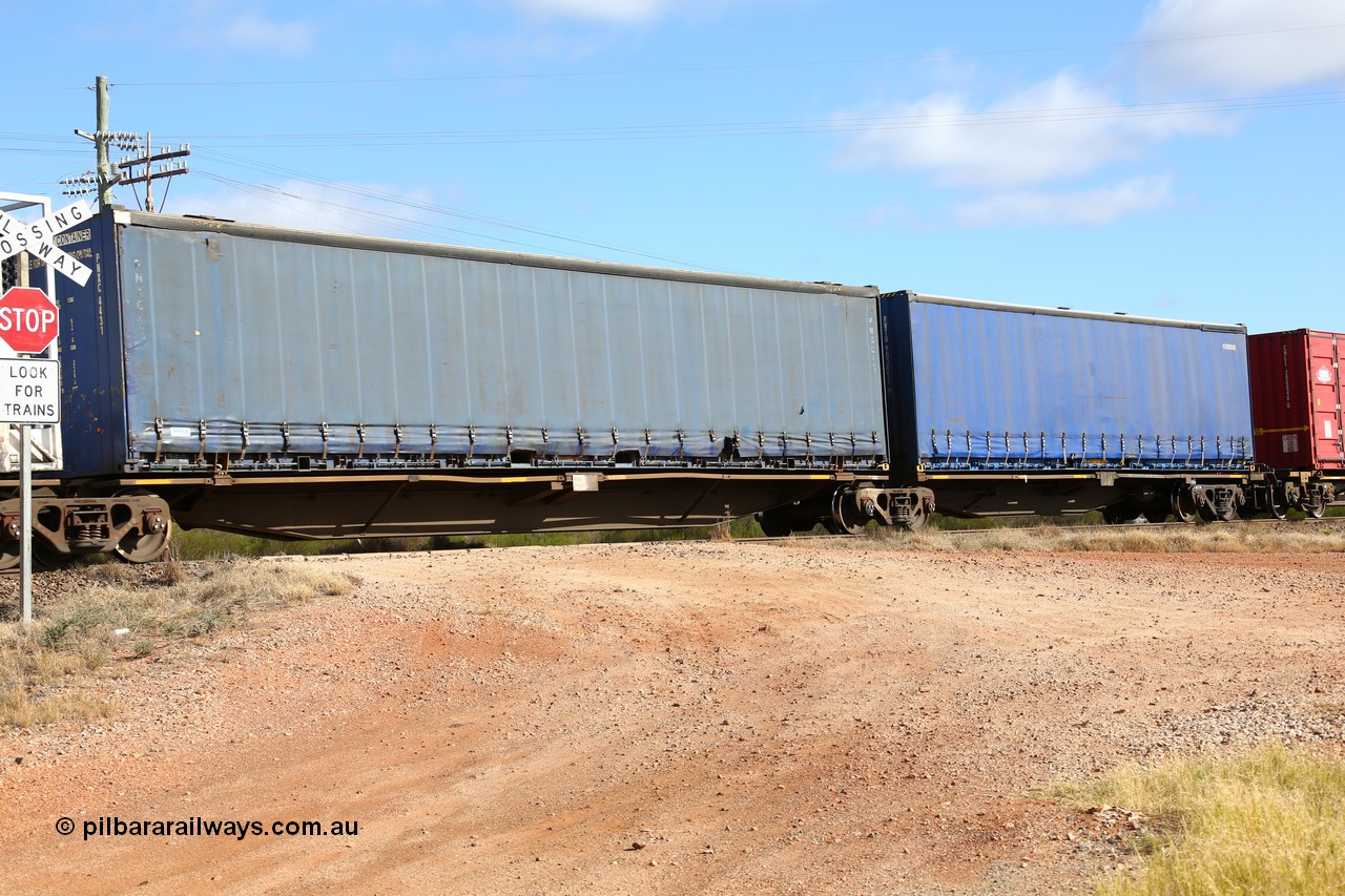 160522 2349
Parkeston, 7MP7 priority service train, RRAY 7190 platform 2 of 5-pack articulated skel waggon set, 1 of 100 built by ABB Engineering NSW 1996-2000, 48' Pacific National curtainsider PNXC 44431.
Keywords: RRAY-type;RRAY7190;ABB-Engineering-NSW;