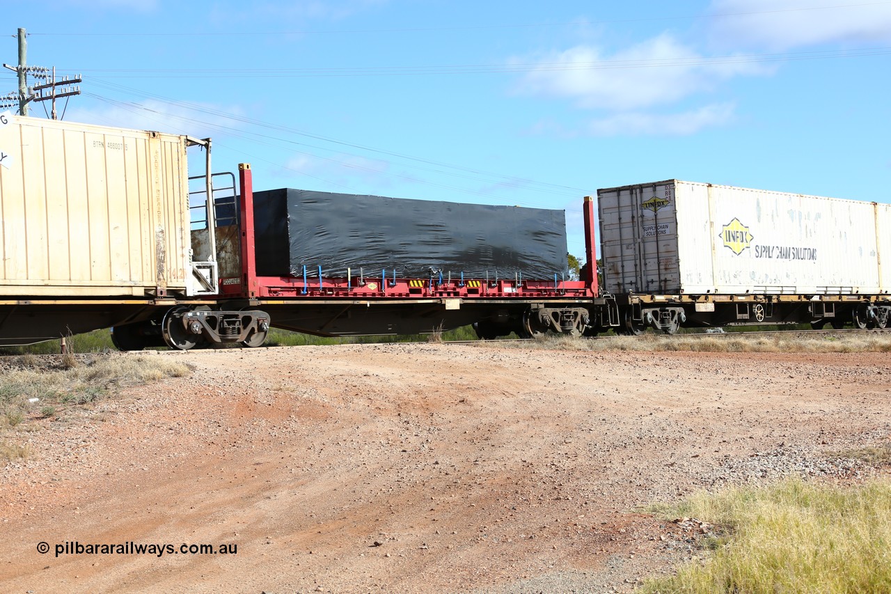 160522 2354
Parkeston, 7MP7 priority service train, RRAY 7243 platform 1 of 5-pack articulated skel waggon set, 1 of 100 built by ABB Engineering NSW 1996-2000, 40' Linfox flatrack FCCU 401025 with plastic wrapped load.
Keywords: RRAY-type;RRAY7243;ABB-Engineering-NSW;