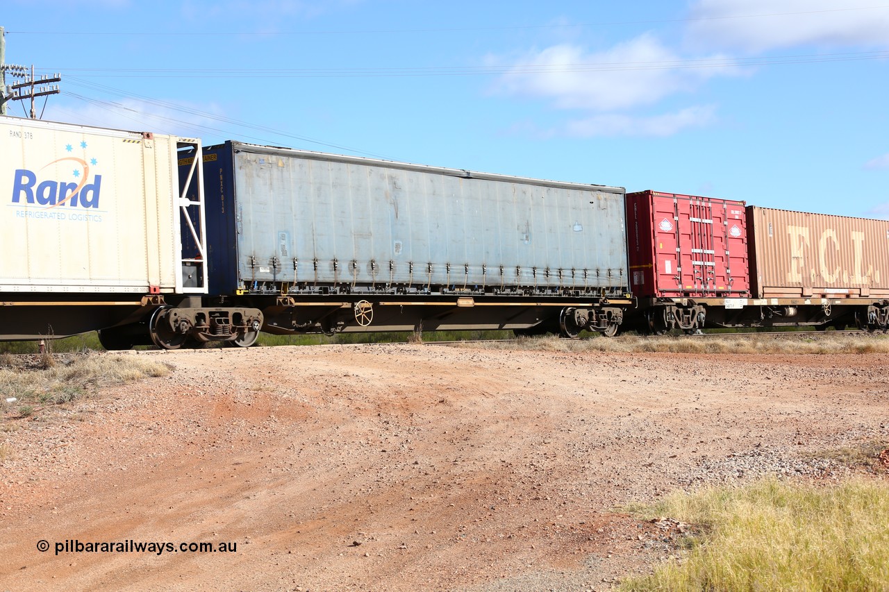 160522 2361
Parkeston, 7MP7 priority service train, platform 1 of 5-pack articulated skel waggon set, Qiqihar Rollingstock Works China built RRQY 8408, Pacific National 48' curtainsider PNXC 013.
Keywords: RRQY-type;RRQY8408;Qiqihar-Rollingstock-Works-China;