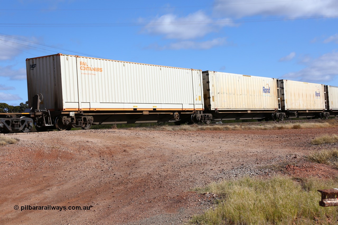 160522 2365
Parkeston, 7MP7 priority service train, platform 5 of 5-pack articulated skel waggon set, Qiqihar Rollingstock Works China built RRQY 8408, 48' MFG1 type Rail Containers box SCFU 412611[2].
Keywords: RRQY-type;RRQY8408;Qiqihar-Rollingstock-Works-China;