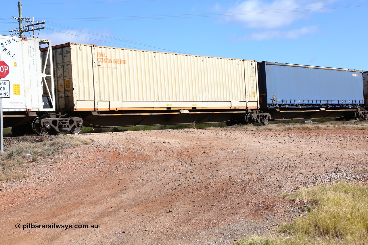 160522 2377
Parkeston, 7MP7 priority service train, RQQY 7077 platform 2 of 5-pack articulated skel waggon set, 1 of 17 built by Qld Rail at Ipswich Workshops in 1995, Rail Containers 48' MFG1 type box SCFU 912368[8].
Keywords: RQQY-type;RQQY7077;Qld-Rail-Ipswich-WS;