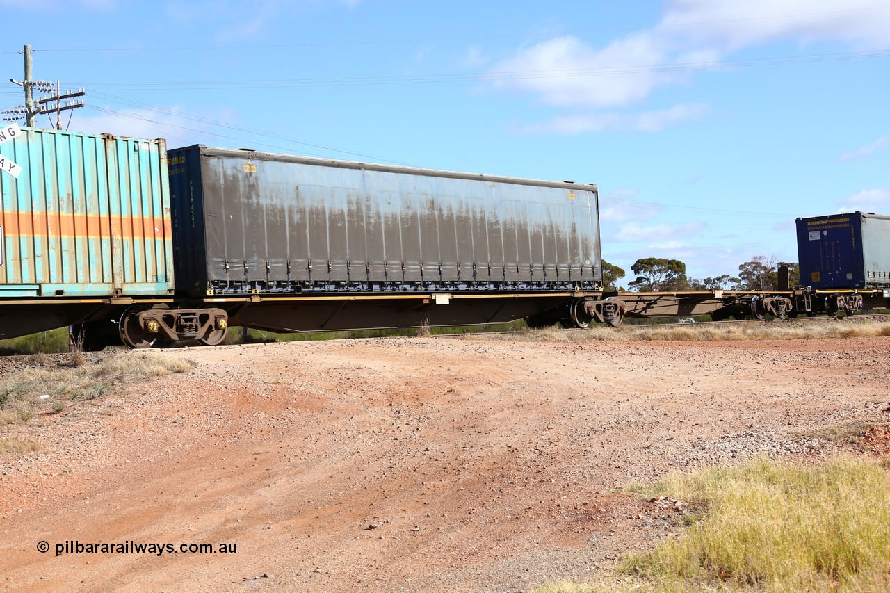 160522 2388
Parkeston, 7MP7 priority service train, RRAY 7229 platform 4 of 5-pack articulated skel waggon set, 1 of 100 built by ABB Engineering NSW 1996-2000, 48' deck, Pacific National 48' curtainsider PNXM 4542.
Keywords: RRAY-type;RRAY7229;ABB-Engineering-NSW;