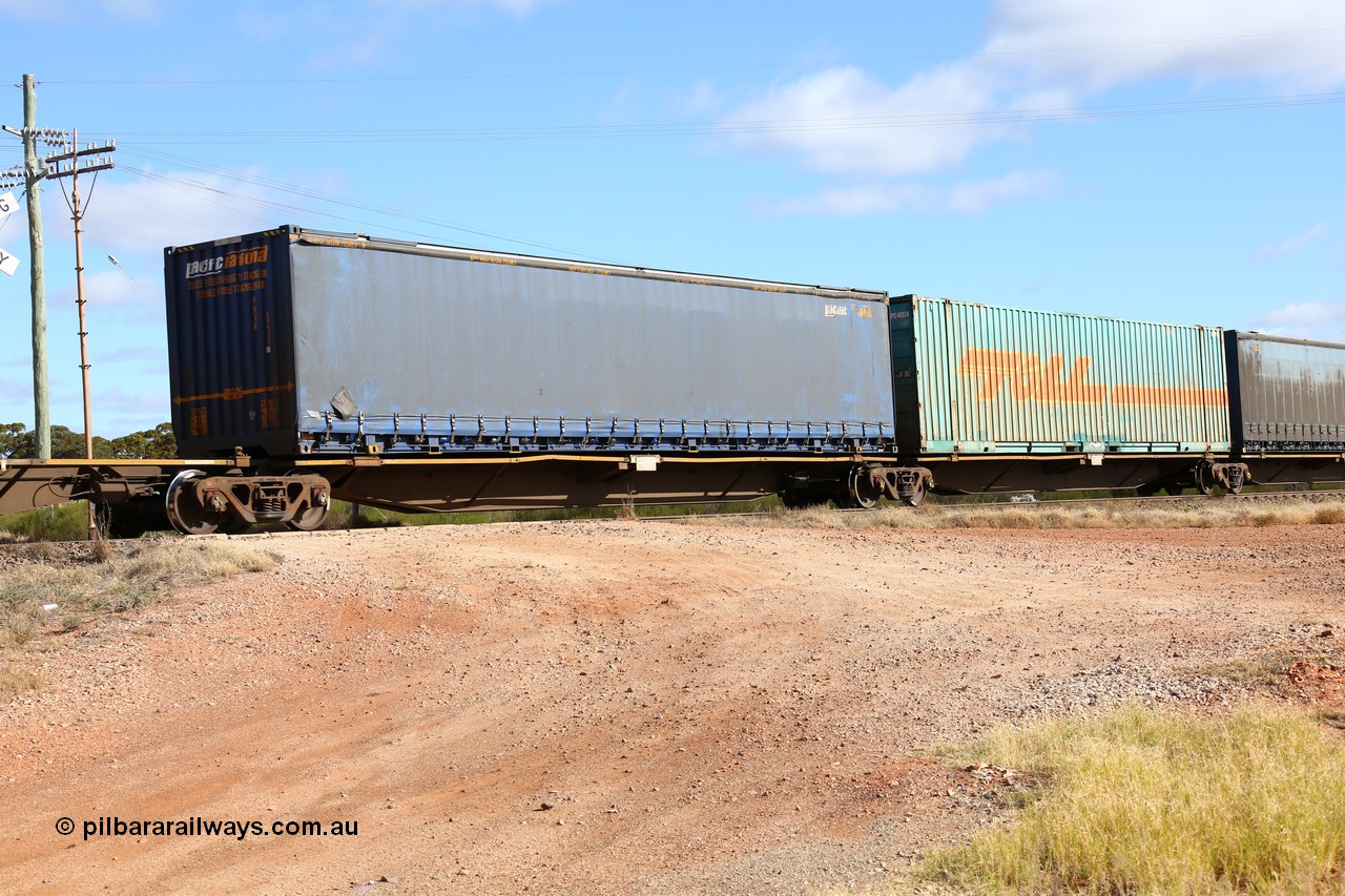 160522 2390
Parkeston, 7MP7 priority service train, RRAY 7229 platform 2 of 5-pack articulated skel waggon set, 1 of 100 built by ABB Engineering NSW 1996-2000, 48' deck, Pacific National 48' MFG4 type curtainsider PNXM 5213.
Keywords: RRAY-type;RRAY7229;ABB-Engineering-NSW;