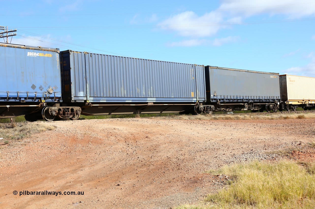 160522 2397
Parkeston, 7MP7 priority service train, platform 2 of 5 on RRQY 8344 5-pack articulated skeletal waggon set the last of a batch of 41 built by Qiqihar Rollingstock Works China in 2005 for Pacific National, with a 48' Pacific National MFG1 type box PNXD 010.
Keywords: RRQY-type;RRQY8344;Qiqihar-Rollingstock-Works-China;