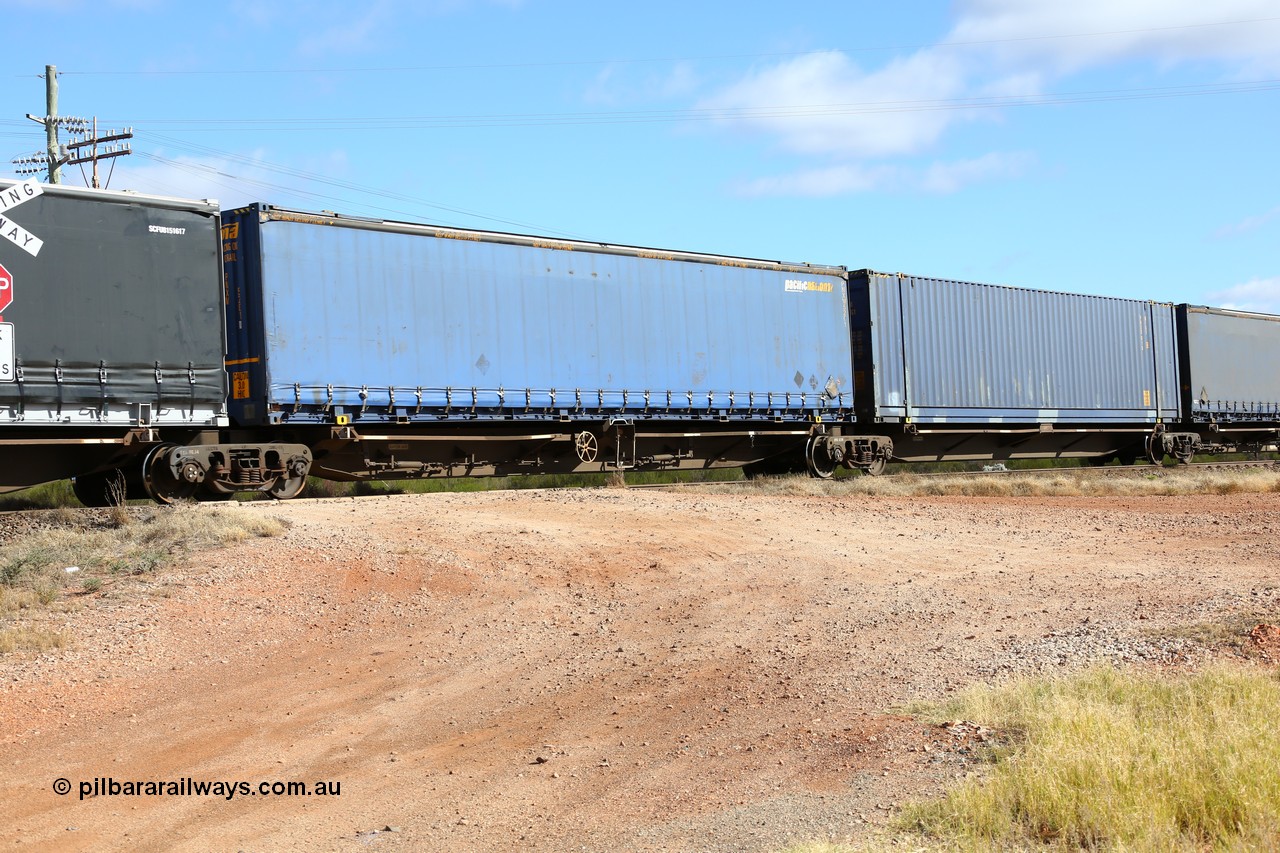 160522 2398
Parkeston, 7MP7 priority service train, platform 3 of 5 on RRQY 8344 5-pack articulated skeletal waggon set the last of a batch of 41 built by Qiqihar Rollingstock Works China in 2005 for Pacific National, with a 48' Pacific National MFG4 type curtainsider PNXM 5201.
Keywords: RRQY-type;RRQY8344;Qiqihar-Rollingstock-Works-China;