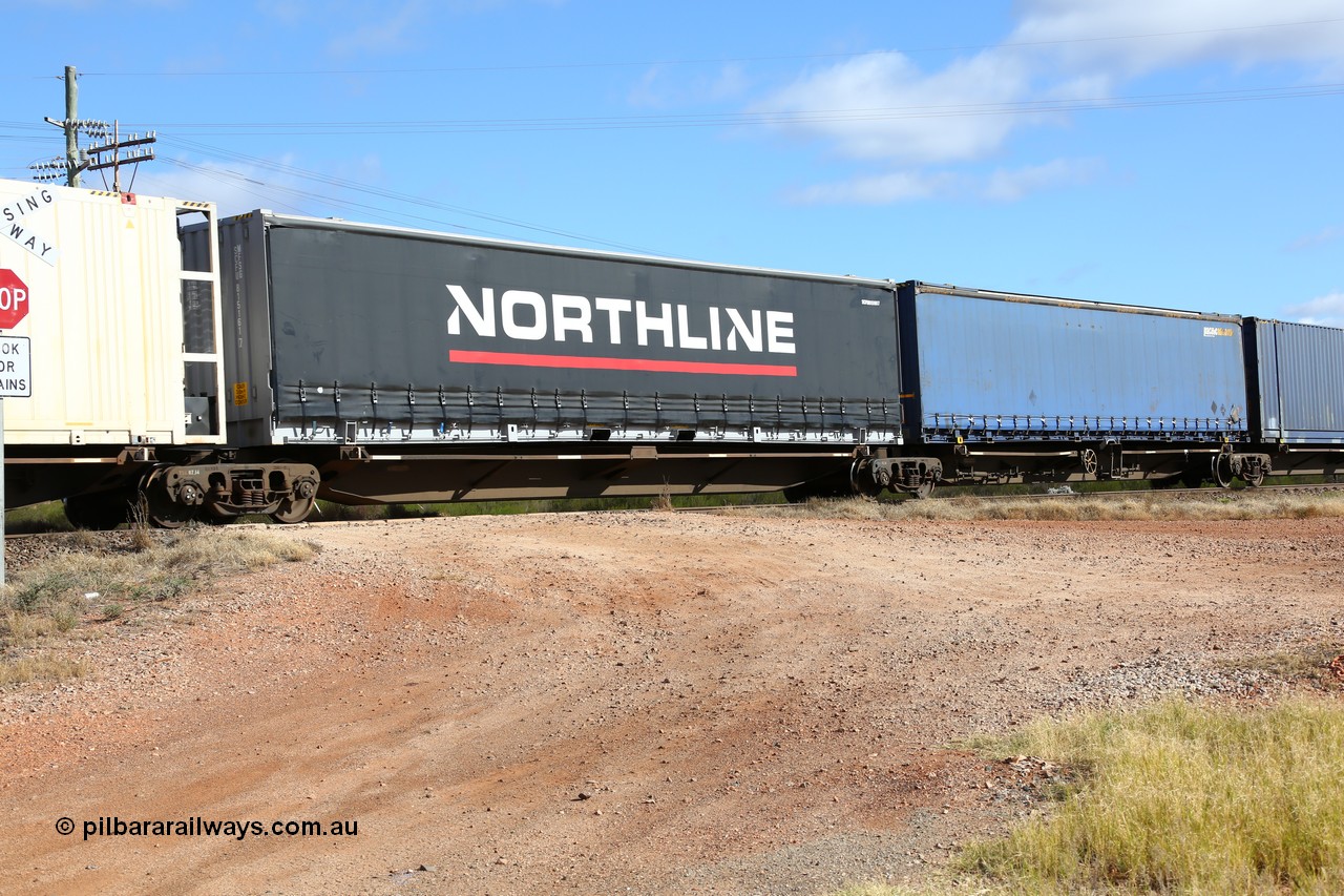 160522 2399
Parkeston, 7MP7 priority service train, platform 4 of 5 on RRQY 8344 5-pack articulated skeletal waggon set the last of a batch of 41 built by Qiqihar Rollingstock Works China in 2005 for Pacific National, with a 48' Northline MFSG type curtainsider SCFU 815161[7].
Keywords: RRQY-type;RRQY8344;Qiqihar-Rollingstock-Works-China;