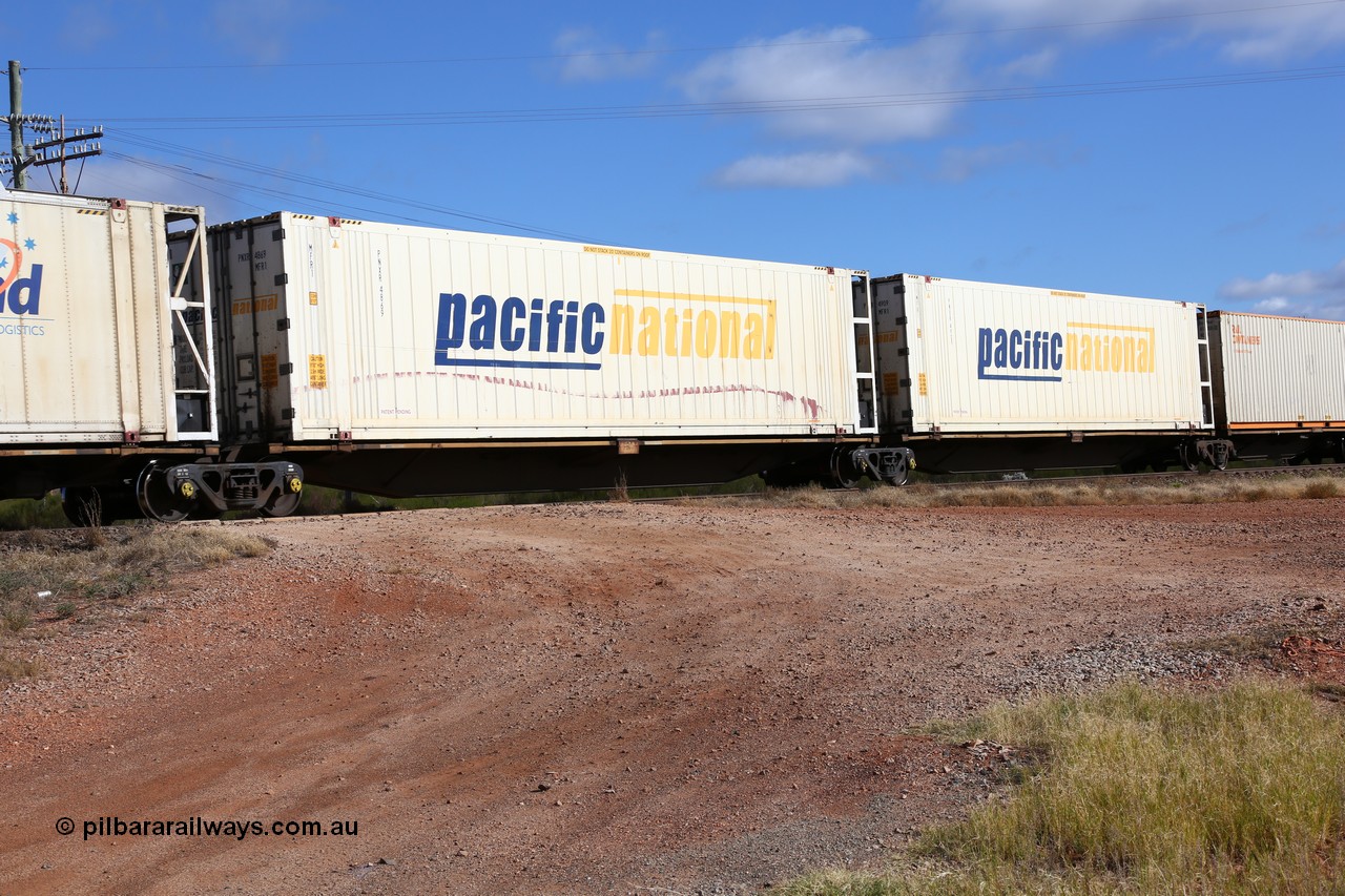 160522 2427
Parkeston, 7MP7 priority service train, platform 3 of 5-pack RRGY 7129 5 pack articulated skel waggon set, originally built as RRBY by AN Rail at Islington Workshops SA 1996-97, 48' deck with a Pacific National 46' 6