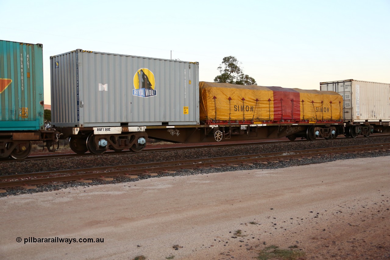 160523 2716
Parkeston, intermodal train 1PM5, RQFY 80 container waggon, built by Victorian Railways Bendigo Workshops in 1980 as a batch of seventy five VQFX type skeletal container waggons, recoded to VQFY c1985, then RQFY May 1994, May 1995 to RQFF, then 2CM bogies fitted in Aug 1995 and current code Feb 1996. Royal Wolf 20' box RWTU 969778 and a 40' FD type flatrack with Simon tarp.
Keywords: RQFY-type;RQFY80;Victorian-Railways-Bendigo-WS;VQFX-type;RQFF-type;
