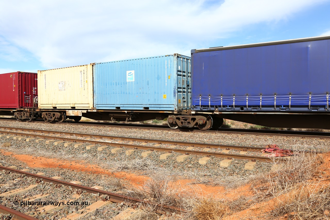160523 2941
Parkeston, 7SP3 intermodal train, RRGY 7128 platform 1 of 5-pack articulated skel waggon, one of fifty originally built by AN Rail Islington Workshops in 1996-97 as type RRBY, later rebuilt with 48' intermediate decks and coded RRGY, 40' deck with two 20' containers ADLU 203738 and NWSU 9204.
Keywords: RRGY-type;RRGY7128;AN-Islington-WS;RRBY-type;