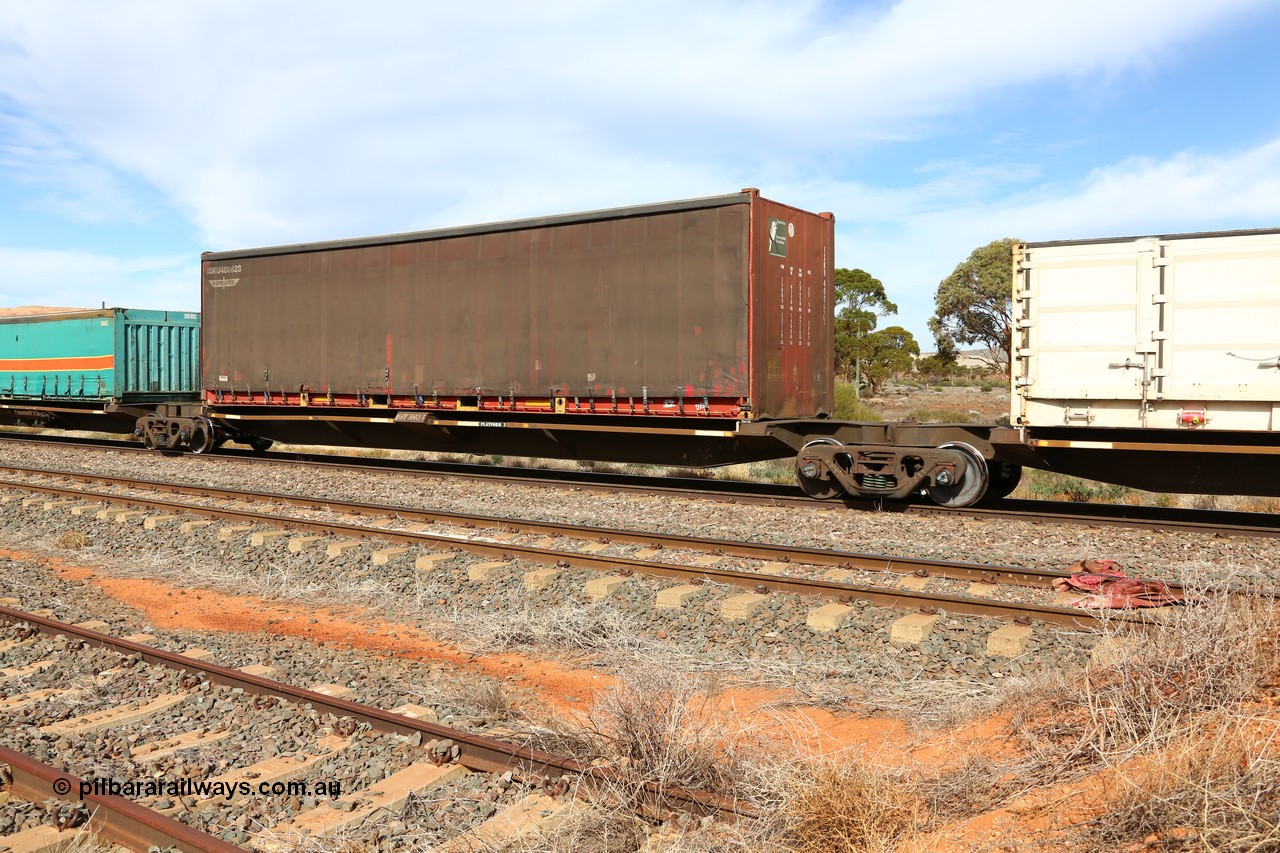 160523 2946
Parkeston, 7SP3 intermodal train, RQQY 7003 platform 2 of 5-pack articulated skel waggon built as a 'one off' by AN Rail Islington Workshops in 1994 as REQY with electric power connections, K+S Freighters ISKU 400623 40' curtainsider container.
Keywords: RQQY-type;RQQY7003;AN-Islington-WS;REQY-type;