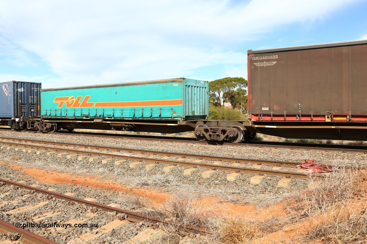 160523 2947
Parkeston, 7SP3 intermodal train, RQQY 7003 platform 1 of 5-pack articulated skel waggon built as a 'one off' by AN Rail Islington Workshops in 1994 as REQY with electric power connections, Toll DS552 40' half height curtainsider container.
Keywords: RQQY-type;RQQY7003;AN-Islington-WS;REQY-type;