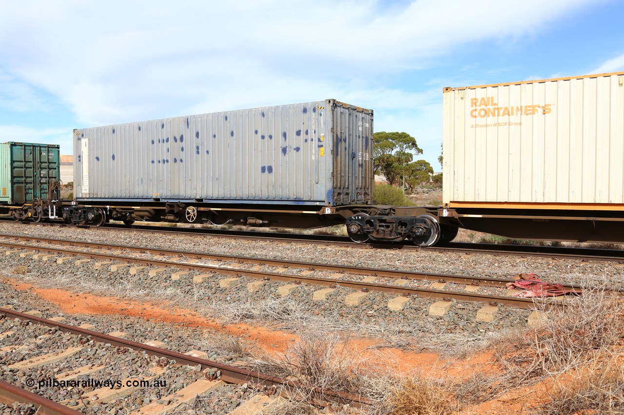 160523 2953
Parkeston, 7SP3 intermodal train, RRQY 8307 platform 5 of 5-pack articulated skel waggon, one of forty one sets built by Qiqihar Rollingstock Works China in 2006 loaded with a SCF 40' box SCFU 471329.
Keywords: RRQY-type;RRQY830P;Qiqihar-Rollingstock-Works-China;