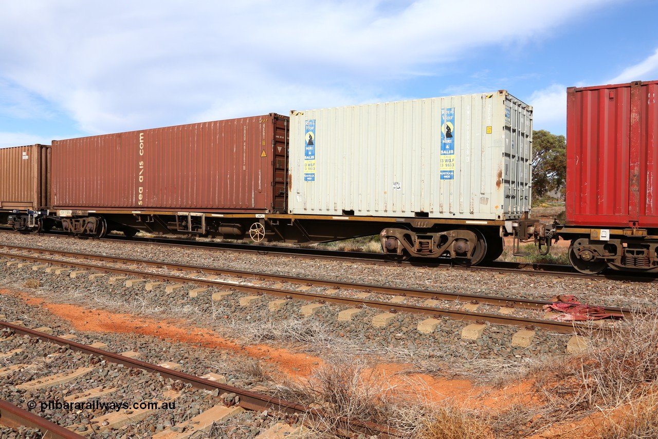 160523 2972
Parkeston, intermodal train 7SP3, RQFY 116 container waggon, built by Victorian Railways Bendigo Workshops in 1980 as a batch of seventy five VQFX type skeletal container waggons, recoded to RQFF then 2CM bogies fitted in 1995. Royal Wolf 20' box RWTU 989258 and a 40' sea axis SAXU 491062.
Keywords: RQFY-type;RQFY116;Victorian-Railways-Bendigo-WS;VQFX-type;RQFF-type;