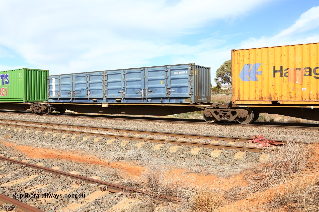 160523 2976
Parkeston, 7SP3 intermodal train, RRGY 7142 platform 4, RRGY type is a 5-pack articulated skeletal container waggon, one of fifty originally built by AN Rail Islington Workshops in 1996-97 as type RRBY, later rebuilt with 48' intermediate decks and recoded to RRGY. Loaded with an SCF 40' half height side door container SCFU 607080[9].
Keywords: RRGY-type;RRGY7142;AN-Islington-WS;RRBY-type;