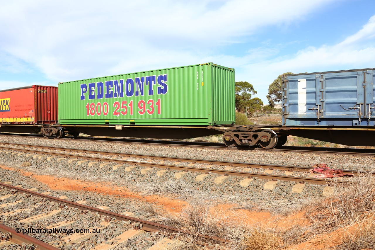 160523 2977
Parkeston, 7SP3 intermodal train, RRGY 7142 platform 3, RRGY type is a 5-pack articulated skeletal container waggon, one of fifty originally built by AN Rail Islington Workshops in 1996-97 as type RRBY, later rebuilt with 48' intermediate decks and recoded to RRGY. Loaded with a Pedemonts 40' 4EG1 type container PHR 419.
Keywords: RRGY-type;RRGY7142;AN-Islington-WS;RRBY-type;