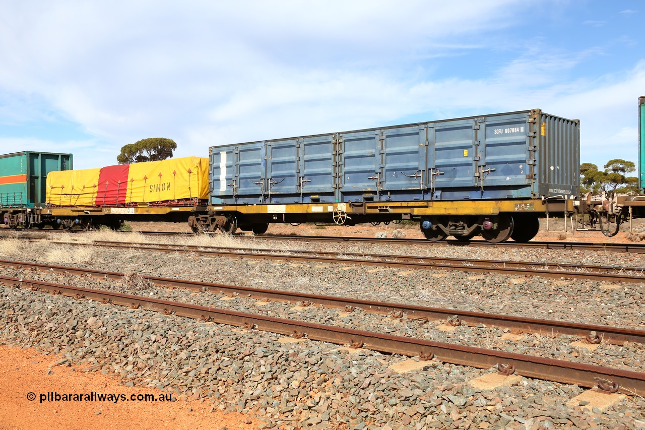 160523 2993
Parkeston, 7SP3 intermodal train, RQEY 1957 2-pack container waggon, originally built by Comeng Qld as the first of forty LEX type louvre waggons in 1966-67, recoded to ALEX, converted to AQEY, recoded to RQEY. Loaded with an SCF half height side door 40' box SCFU 607084[0] and a Simon 40' flatrack FD 131 with a Simon tarped load.
Keywords: RQEY-type;RQEY1957;Comeng-Qld;LEX-type;ALEX-type;AQEY-type;