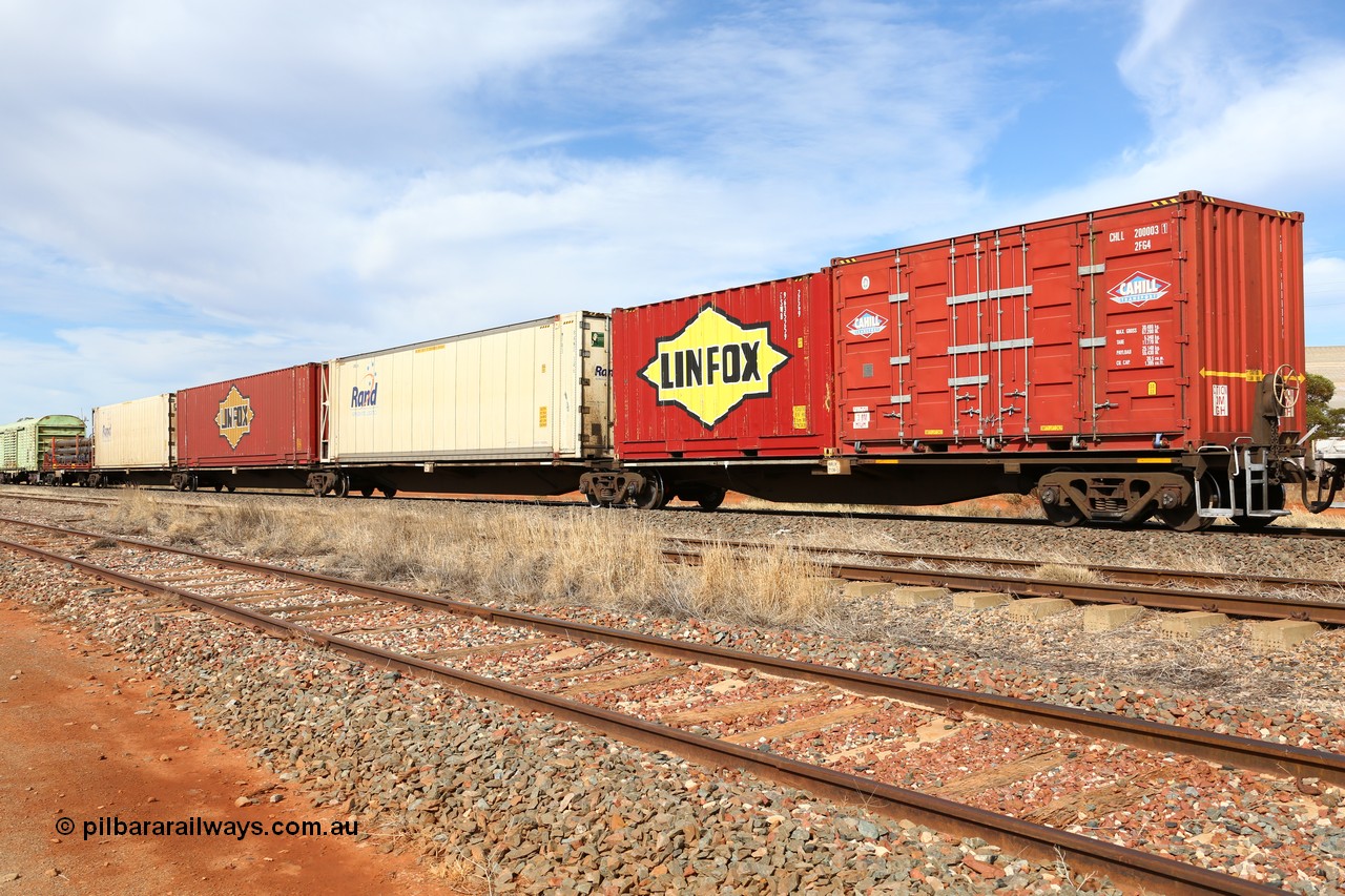 160523 3028
Parkeston, 7SP3 intermodal train, RRGY 7136 5-pack articulated skeletal waggon, one of fifty originally built by AN Rail Islington Workshops in 1996-97 as type RRBY, later rebuilt with 48' intermediate decks and recoded to RRGY with a range of 20' boxes, 46' 6