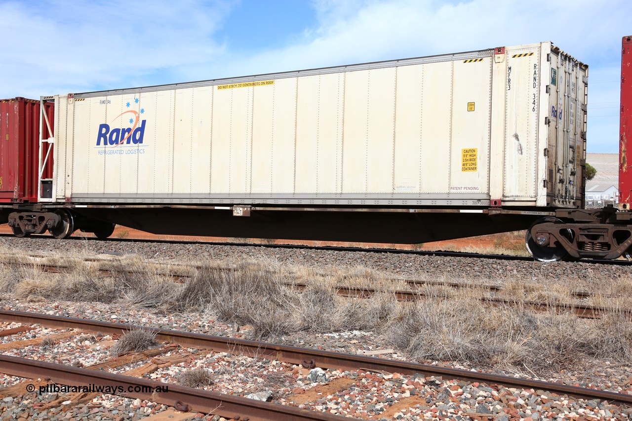160523 3030
Parkeston, 7SP3 intermodal train, RRGY 7136 platform 2 of 5-pack articulated skeletal waggon, one of fifty originally built by AN Rail Islington Workshops in 1996-97 as type RRBY, later rebuilt with 48' intermediate decks and coded RRGY, Rand Refrigerated Logistics 46' 6