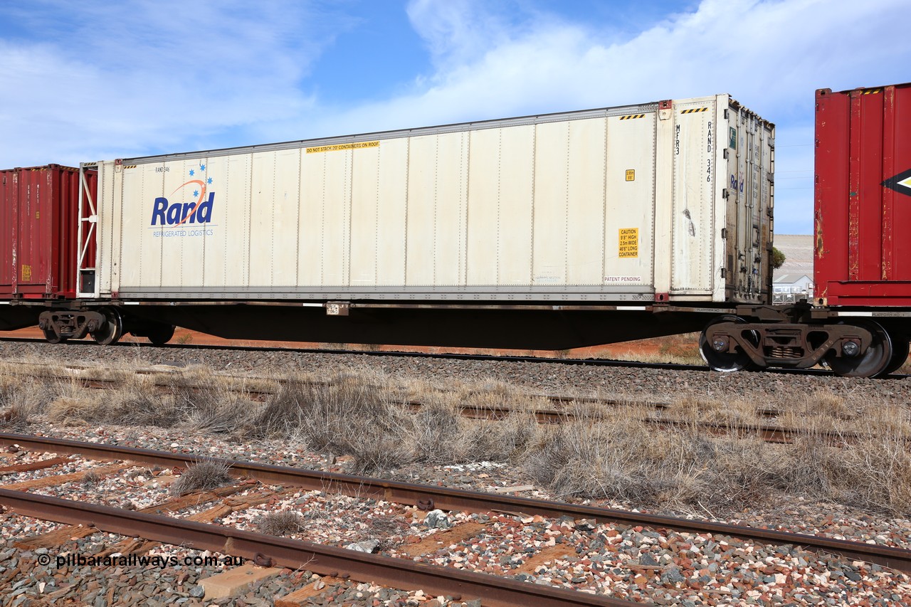 160523 3031
Parkeston, 7SP3 intermodal train, RRGY 7136 platform 2 of 5-pack articulated skeletal waggon, one of fifty originally built by AN Rail Islington Workshops in 1996-97 as type RRBY, later rebuilt with 48' intermediate decks and coded RRGY, RAND Refrigerated Logistics 46' 6