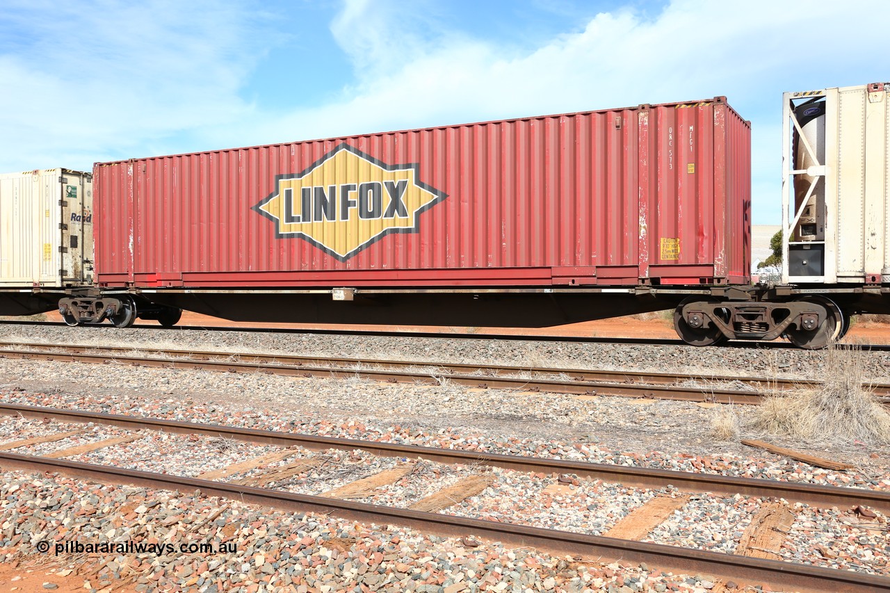 160523 3032
Parkeston, 7SP3 intermodal train, RRGY 7136 platform 3 of 5-pack articulated skeletal waggon, one of fifty originally built by AN Rail Islington Workshops in 1996-97 as type RRBY, later rebuilt with 48' intermediate decks and coded RRGY, Linfox 48' MFG1 type box DRC 573.
Keywords: RRGY-type;RRGY7136;AN-Islington-WS;RRBY-type;