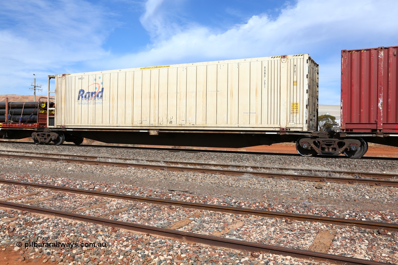 160523 3033
Parkeston, 7SP3 intermodal train, RRGY 7136 platform 4 of 5-pack articulated skeletal waggon, one of fifty originally built by AN Rail Islington Workshops in 1996-97 as type RRBY, later rebuilt with 48' intermediate decks and coded RRGY, RAND Refrigerated Logistics 46' 6