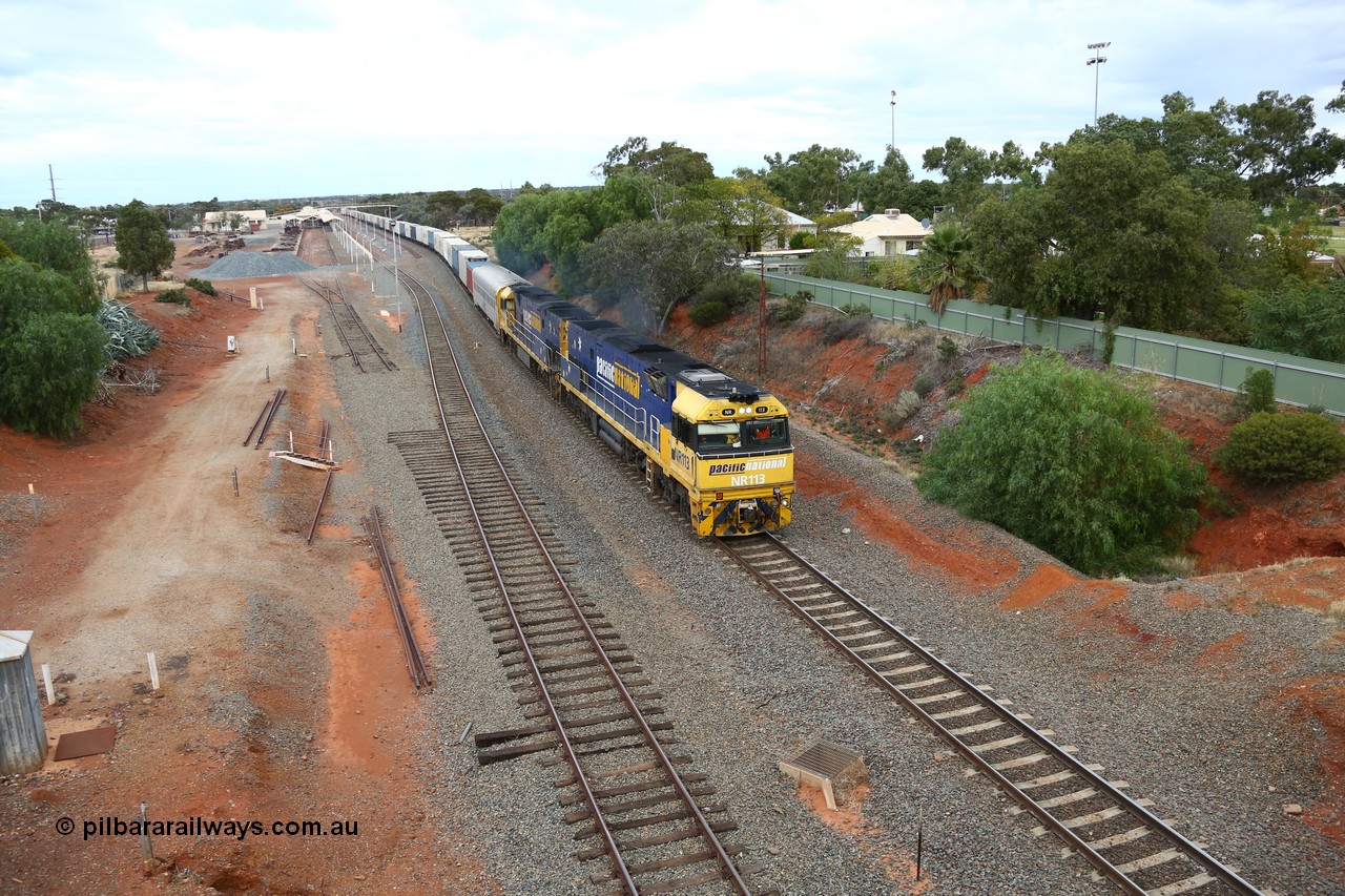 160524 3635
Kalgoorlie, priority service 2PS7 passes the station environs behind Goninan built GE model Cv40-9i NR class unit NR 113 serial 7250-09/97-312, originally built for National Rail now in current owner Pacific National livery, the timber sleepers still in situ for the points to the dock road.
Keywords: NR-class;NR113;Goninan;GE;Cv40-9i;7250-09/97-312;
