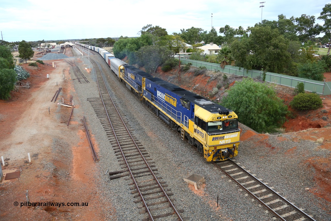 160524 3636
Kalgoorlie, priority service 2PS7 passes the station environs behind Goninan built GE model Cv40-9i NR class unit NR 113 serial 7250-09/97-312, originally built for National Rail now in current owner Pacific National livery, the timber sleepers still in situ for the points to the dock road.
Keywords: NR-class;NR113;Goninan;GE;Cv40-9i;7250-09/97-312;